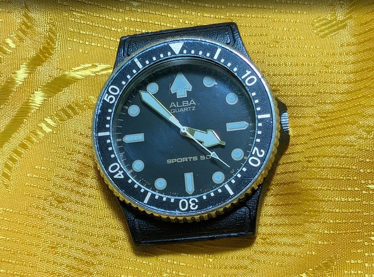 Vintage Pre-Owned ALBA Quartz Watch Y481-014A Sports 50 Diver Style Black Dial Rotating Bezel Japan Mens Watch from Seiko .case 37mm.NEW Battery