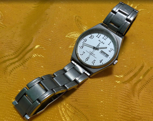 Vintage Pre-Owned Seiko Alba VX43-0AG0 Kanji Titanium Quartz Watch Japan Day Date Men's Watch Working Rare