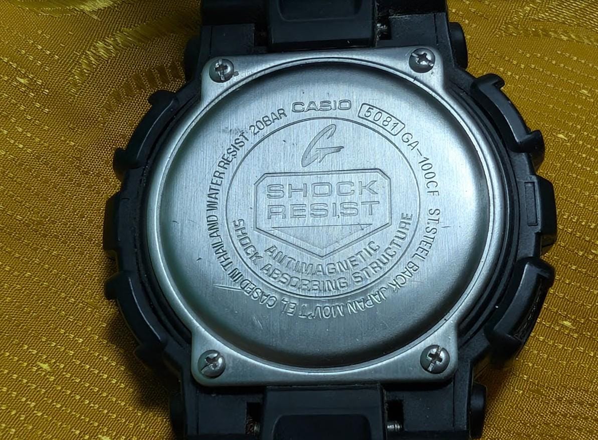 Vintage Pre-Owned Casio G-Shock GA-100CF Camouflage Dial Military Watch 50mm Ana Digi New Battery Black .New battery