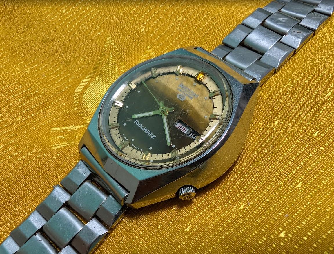 Rare Vintage Pre-Owned Ricoh Riquartz Tiger Eye Dial Japan Watch 38mm Day Date Quartz Steel Bracelet Working Condition