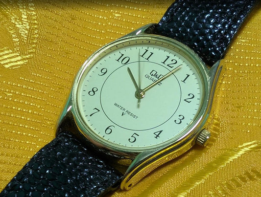 Vintage Pre-Owned Q&Q by Citizen Quartz Japan Watch 33mm Minimalist Dress Watch Black Stingray Style Leather Strap Working