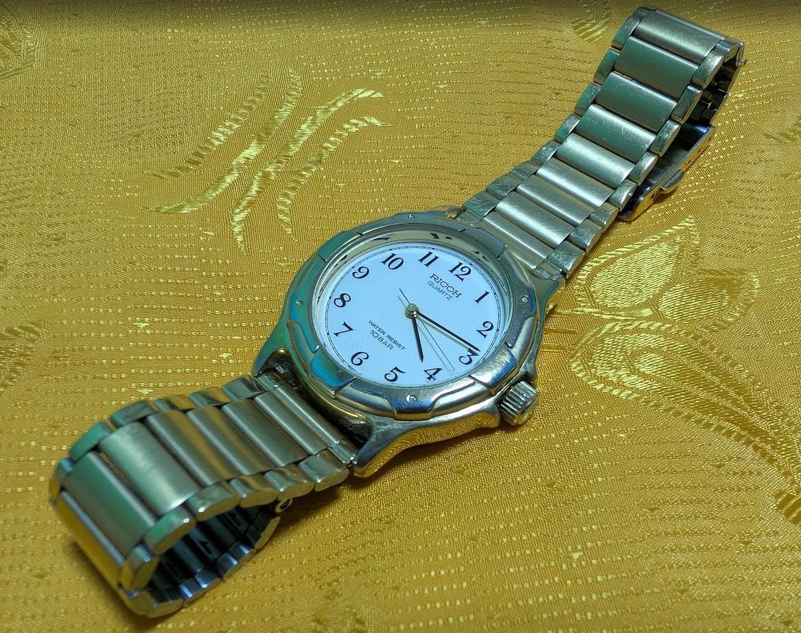 Vintage Pre-Owned Ricoh Quartz 352102 Japan Watch 10 BAR Water Resist Stainless Steel Bracelet 36mm Classic Dress Wristwatch