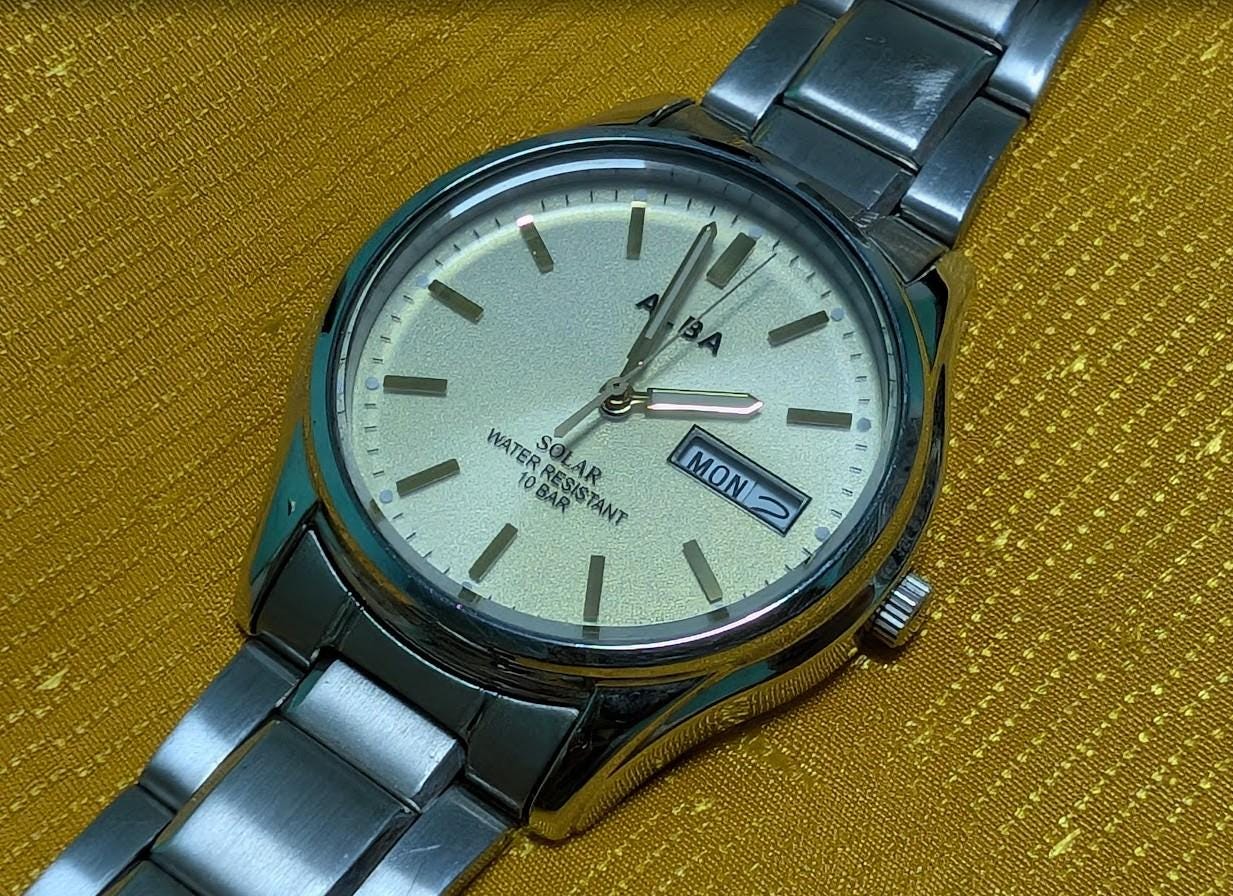 Vintage Pre-Owned Seiko Alba V158-0AX0 Solar Watch 37mm Silver Dial Day Date Stainless Steel Japan Working