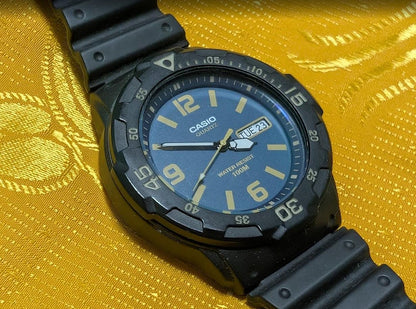 Vintage Pre-Owned Casio MRW-200H Blue Dial Diver Style Watch Rotating Bezel Early No Letter After H Version.New battery