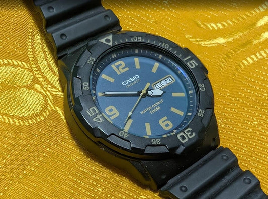 Vintage Pre-Owned Casio MRW-200H Blue Dial Diver Style Watch Rotating Bezel Early No Letter After H Version.New battery