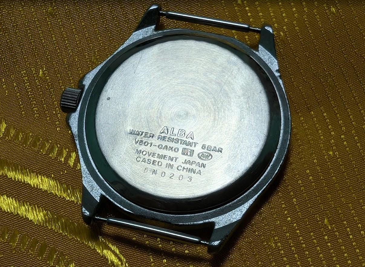 Vintage Pre-Owned ALBA V501-0AK0 Field Style Quartz Watch 37mm Military Dial New Battery Working Japan Movement.