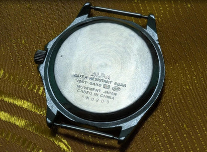 Vintage Pre-Owned ALBA V501-0AK0 Field Style Quartz Watch 37mm Military Dial New Battery Working Japan Movement.