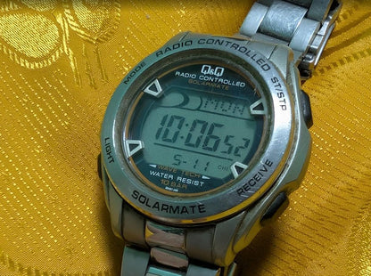 Vintage Pre-Owned QandQ Solarmate P62 Radio Controlled Solar Digital Watch Citizen Japan Retro Steel Watch