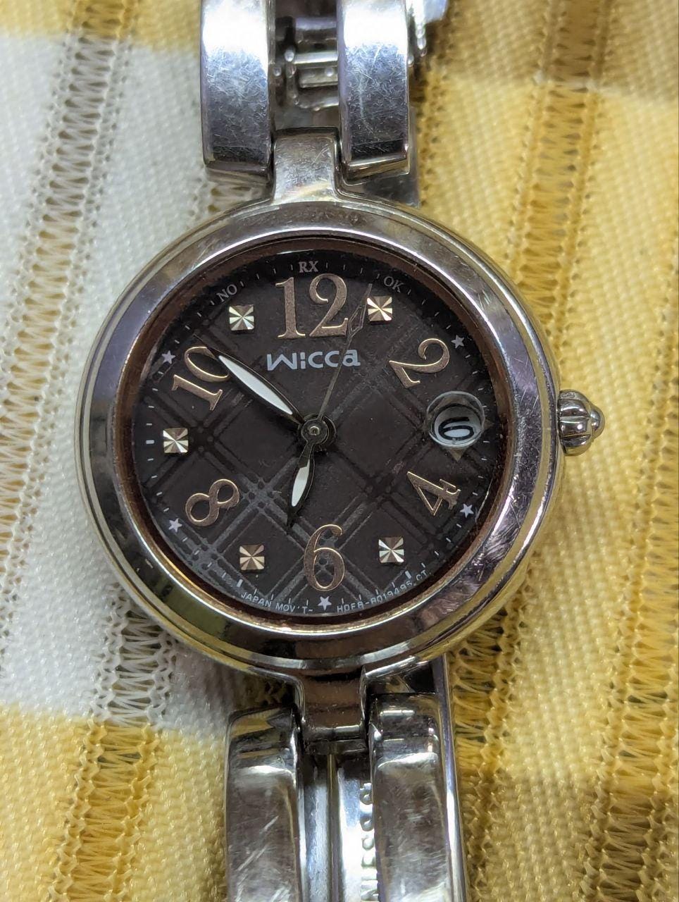 Vintage Pre-Owned Citizen Wicca H0F8 Solar Radio Controlled Women’s Watch Brown Dial Date Stainless Steel Bracelet Japan